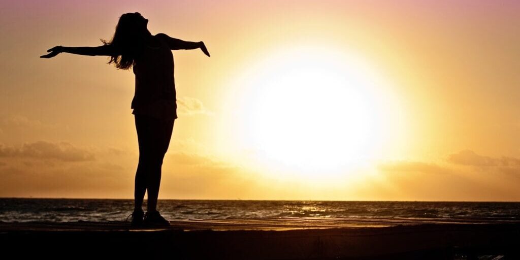 silhouette of a person on the beach